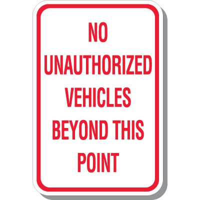 No Unauthorized Vehicles Beyond This Point Signs