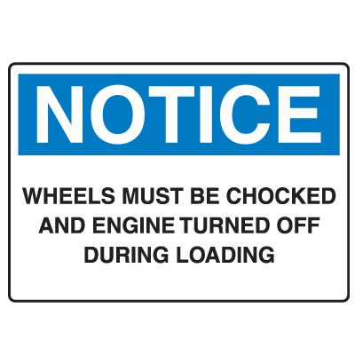 Traffic & Parking Signs - Notice Wheels Must Be Chocked